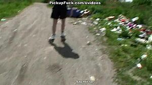 Amateur girl on roller skates gives a blowjob in public